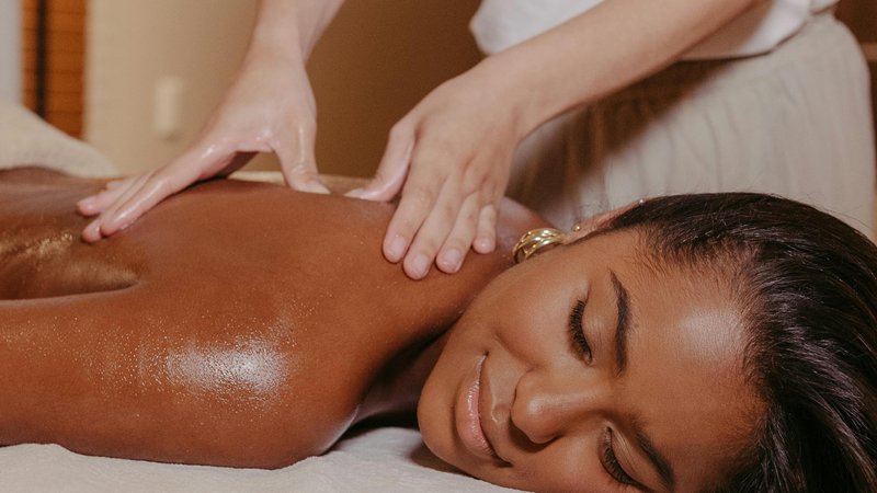 Thai Herbal Compress vs Hot Stone Massage: Heat Therapy Compared - Meraki Spa Raipur