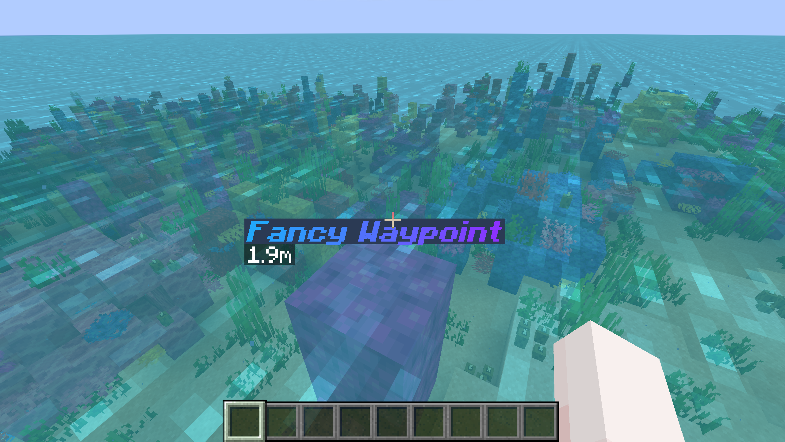 Colorful bold italic waypoint display name rendered in the world