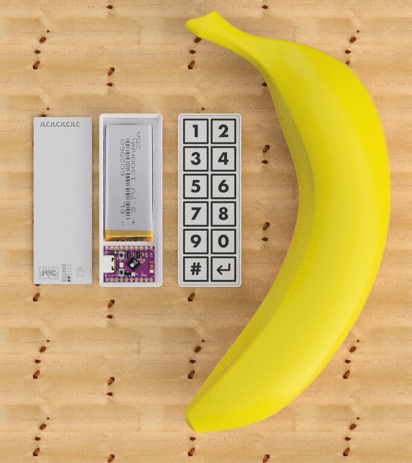 All parts laid out next to a banana for size comparison