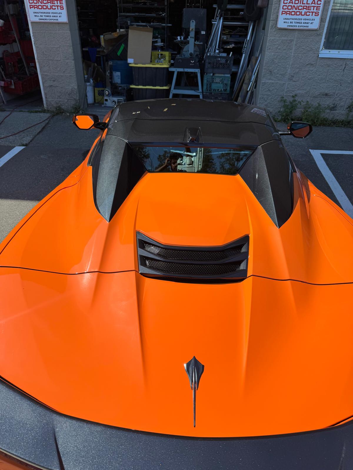 Close-up of deep reflection on vehicle paint, showing protection.