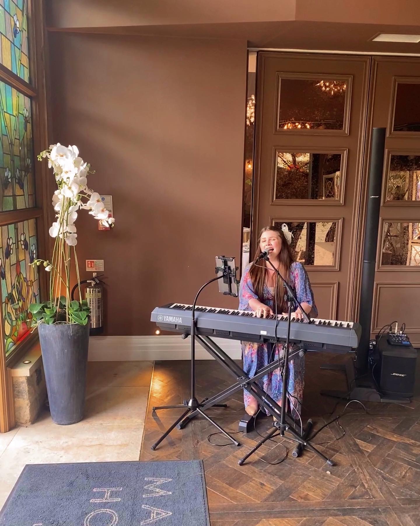 Kasia Howley performing live piano vocals at Manor House