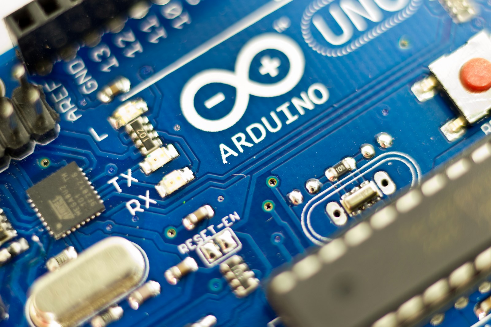 Close-up of blue circuit-board traces and electronic components