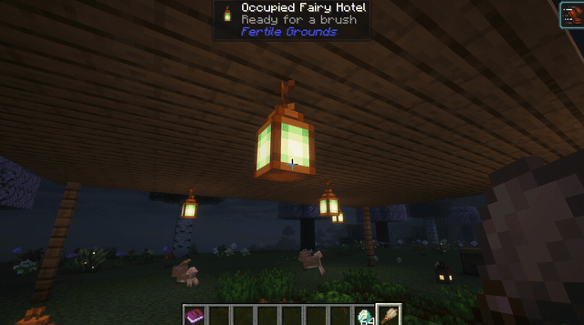 Brushing a Fairy Hotel hanging from a pergola, with hearts and sparkles