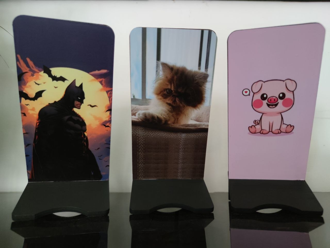 Portacelulares Batman, gato y cerdito