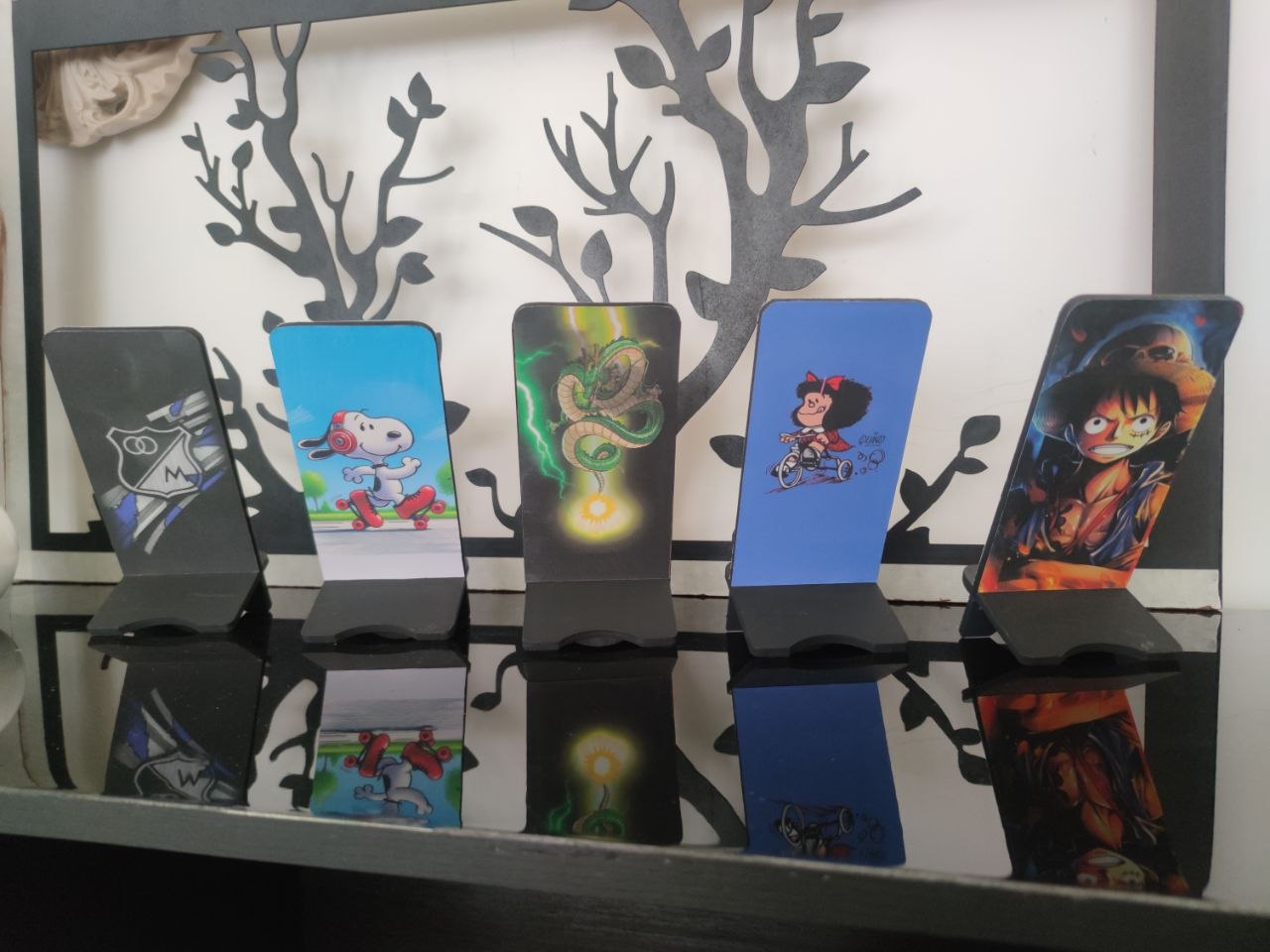 Portacelulares Millonarios, Snoopy, Shenlong, Mafalda y Luffy