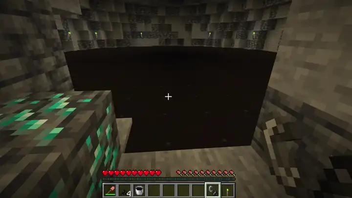 An oil lake catching fire, burning out and leaving soot behind