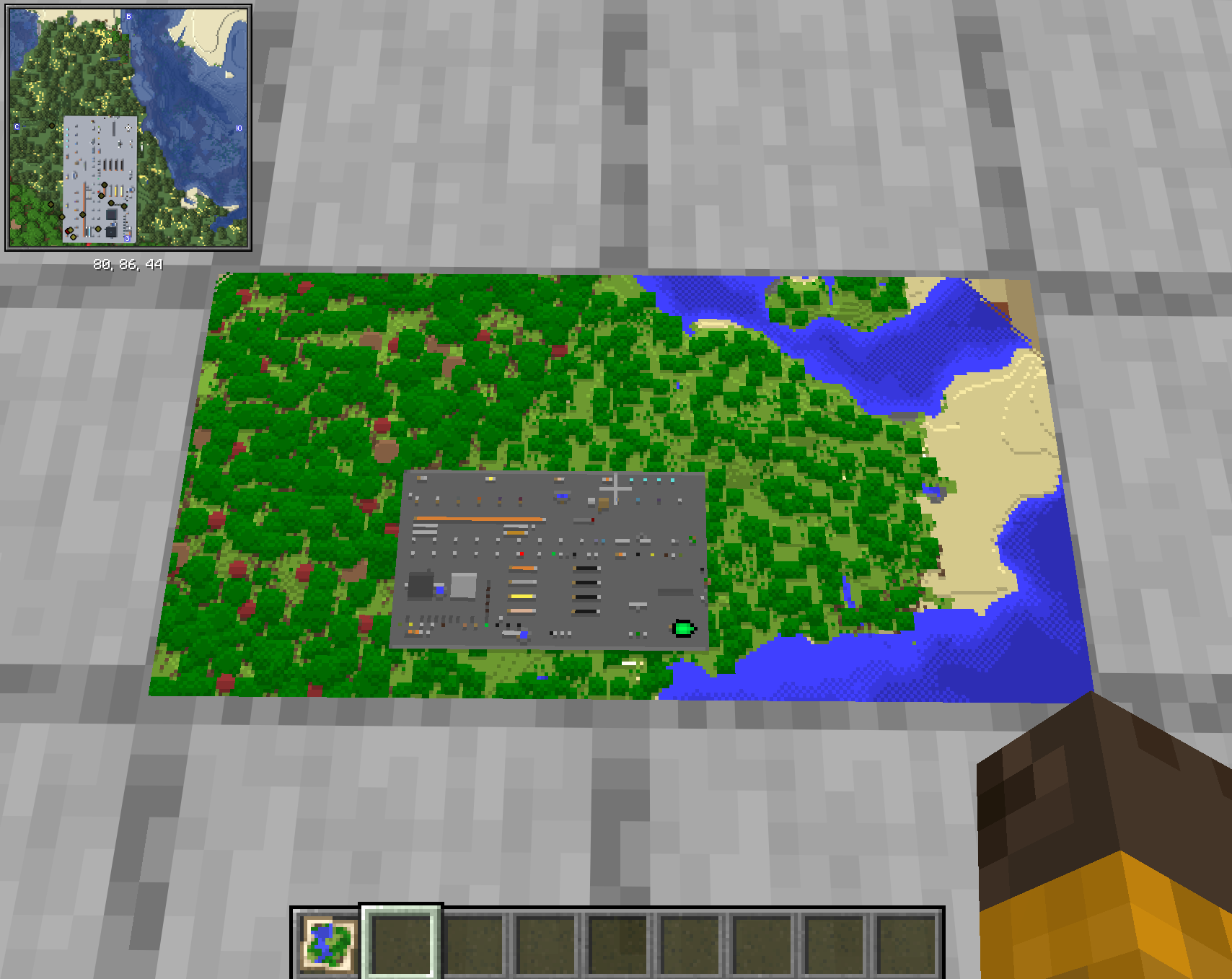 Ala Industrial Minecraft mod: vanilla map on item frames showing a base of machines, cables and chests beside a forest and a lake