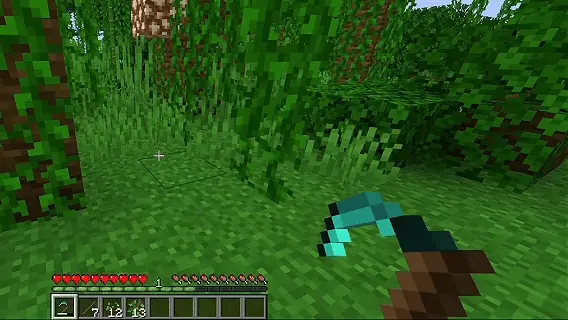 A scythe clearing a wide area of foliage in one swing