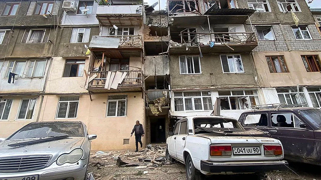 Civilian buildings and vehicles damaged by Azerbaijani strikes in Artsakh.