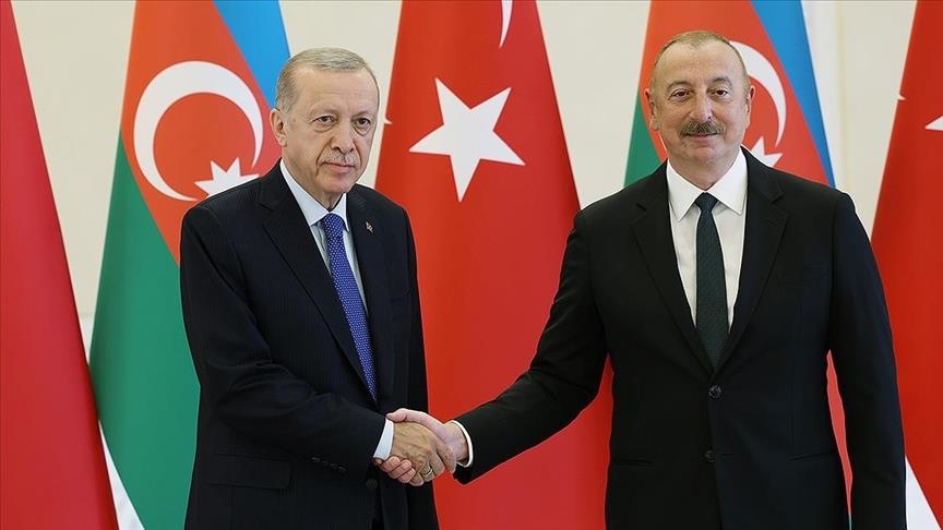 President Erdogan of Turkey and President Aliyev of Azerbaijan shake hands during a meeting on September 20, 2023.