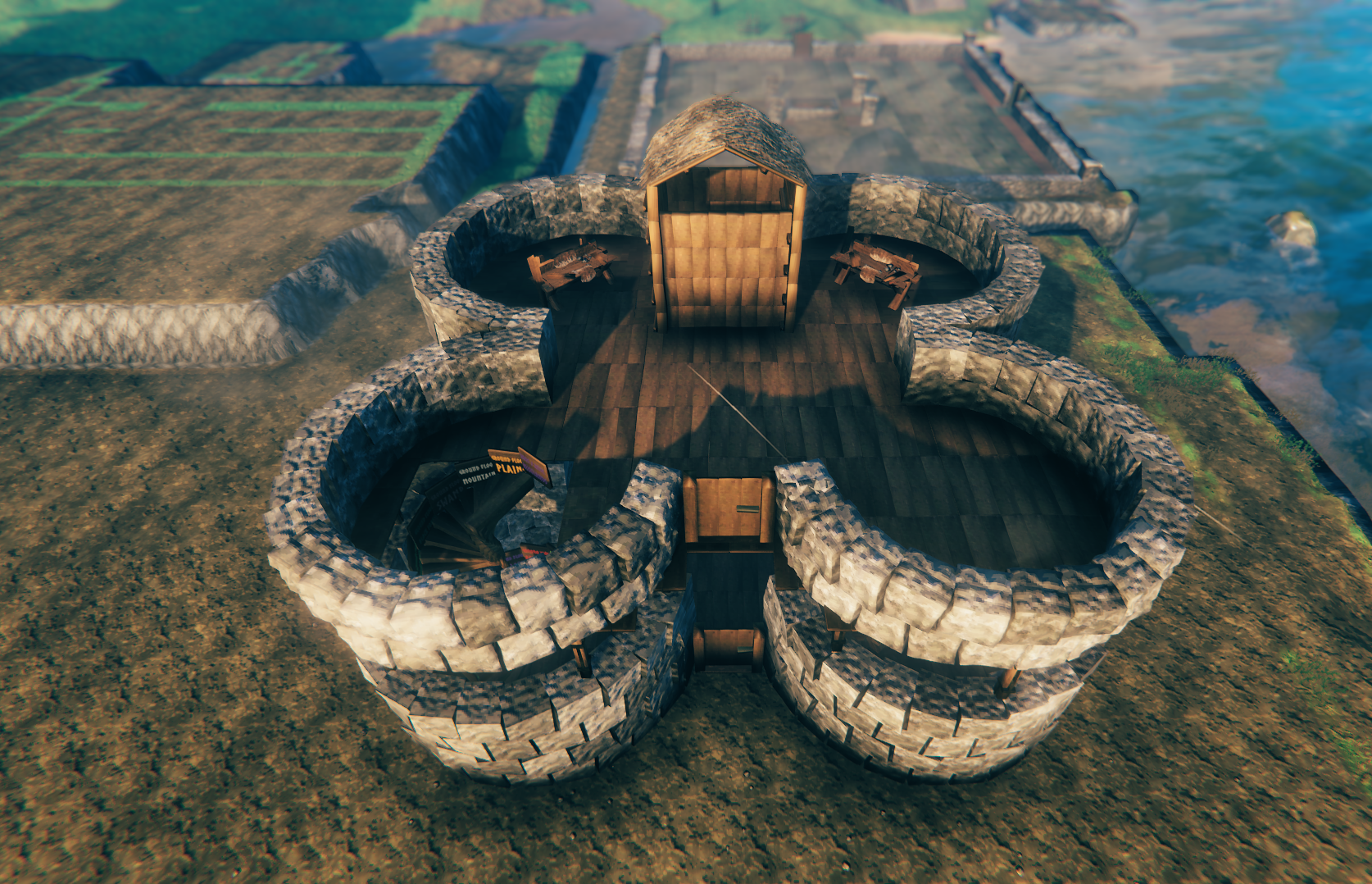 In-game: aerial view of the castle keep with FlexiWall circular towers at each corner