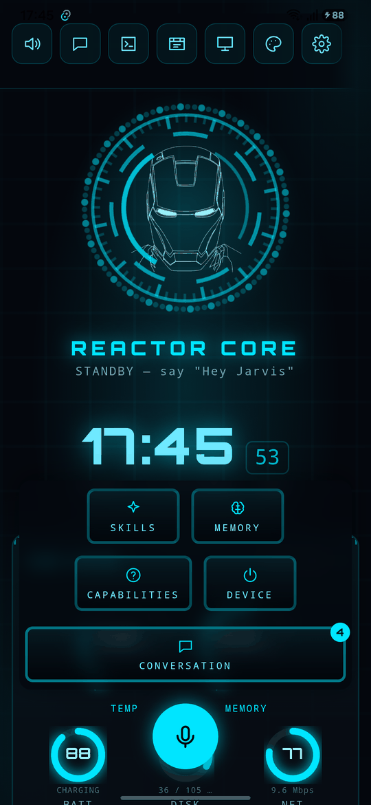 The JARVIS HUD on a phone: the Reactor Core idle and waiting for "Hey Jarvis", a clock, and the Skills, Memory, Capabilities, Device and Conversation panels over battery, disk and network gauges