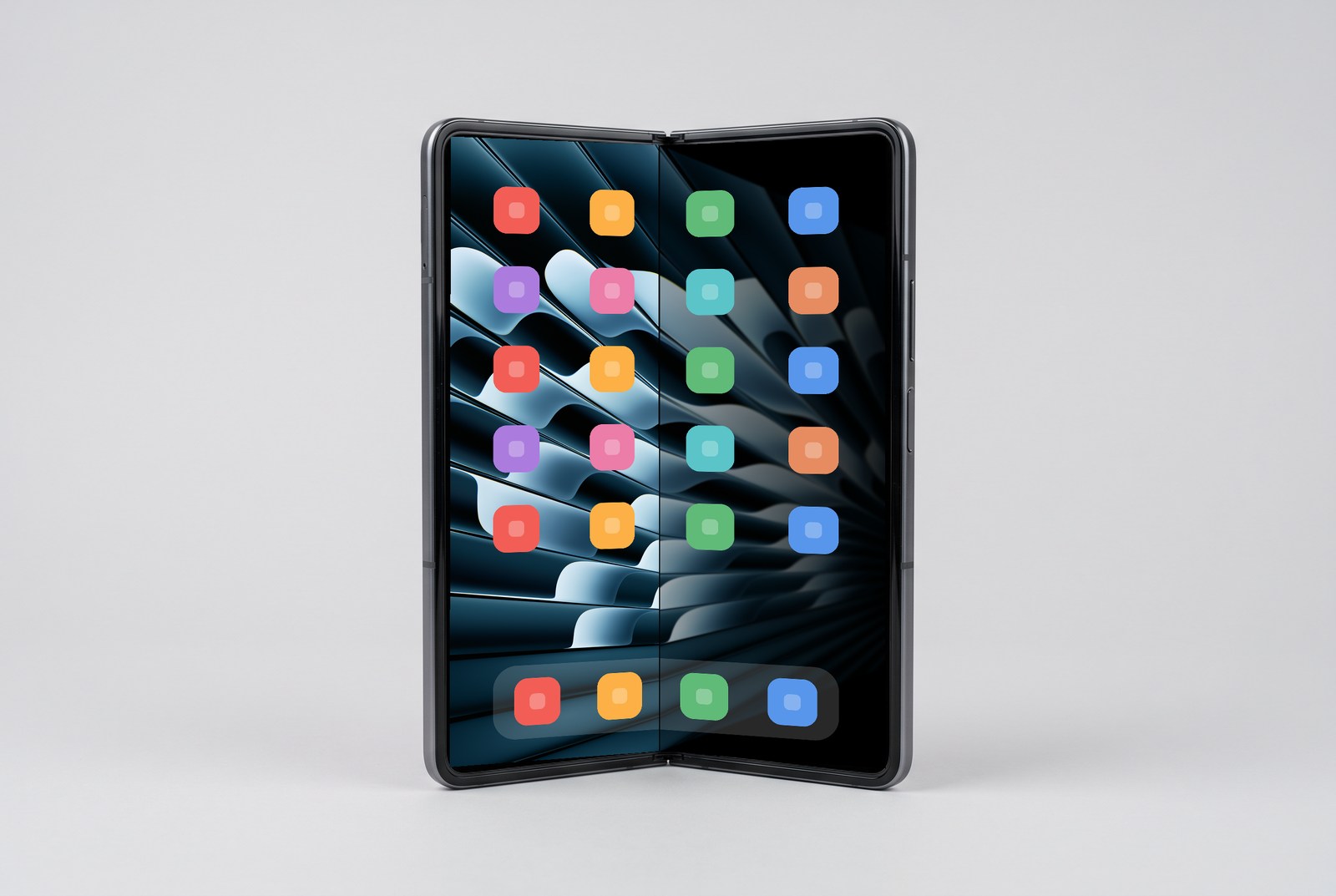 A foldable held open at 140 degrees, the moving half frosted and the icons sharp