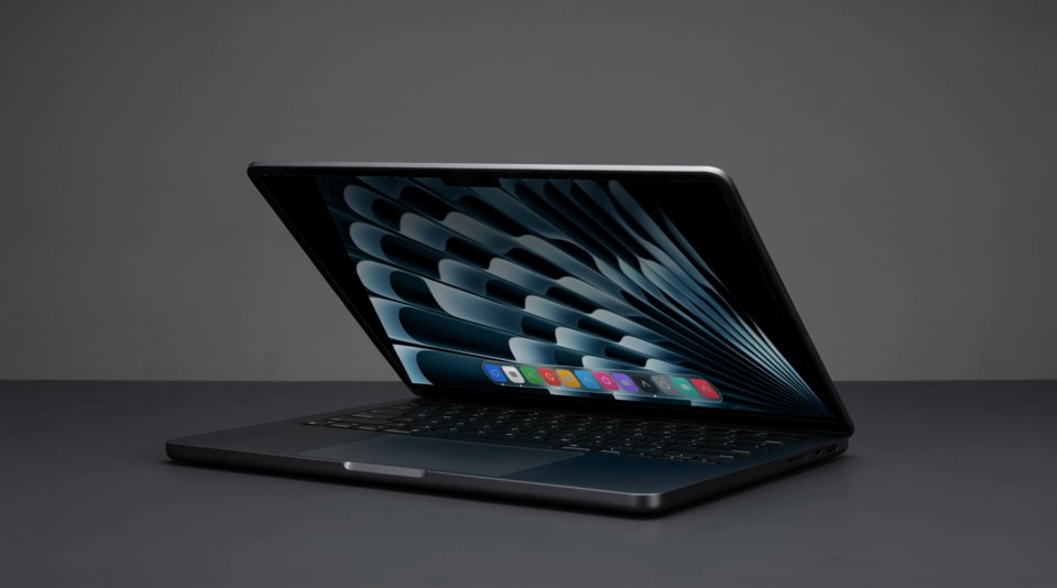 A MacBook closing with the effect, mid fold