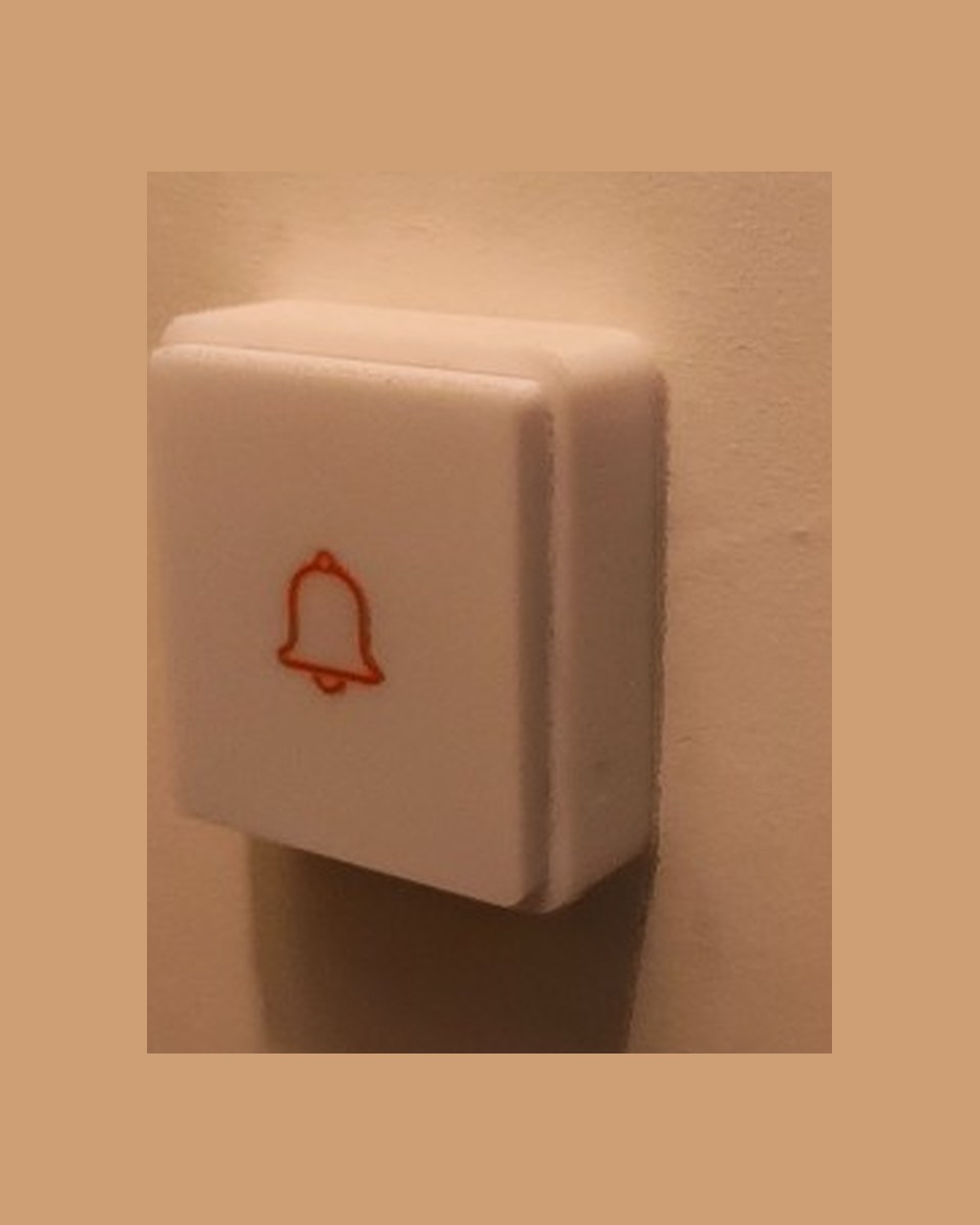 Outdoor doorbell mounted on the wall