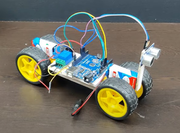 Autonomous Mini Car for Ultrasonic Collision Avoidance