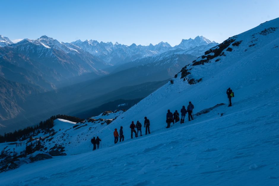 Mountain Group Of Trekkers Navigating Snowy Slopes In The Majestic Singtur Range, India. HD Wallpaper #3866