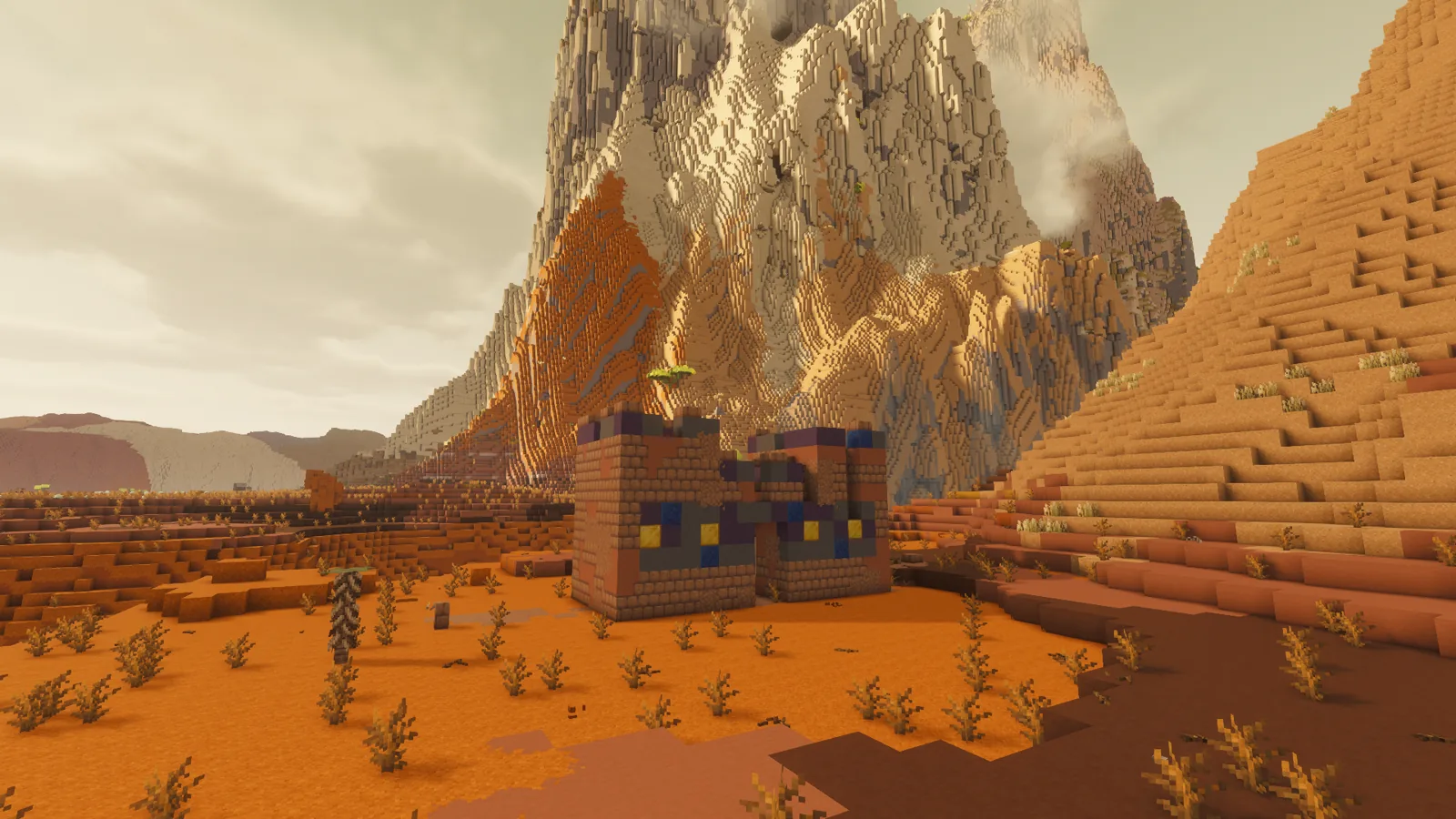 The Ishtar Gate below a striped mesa at golden hour