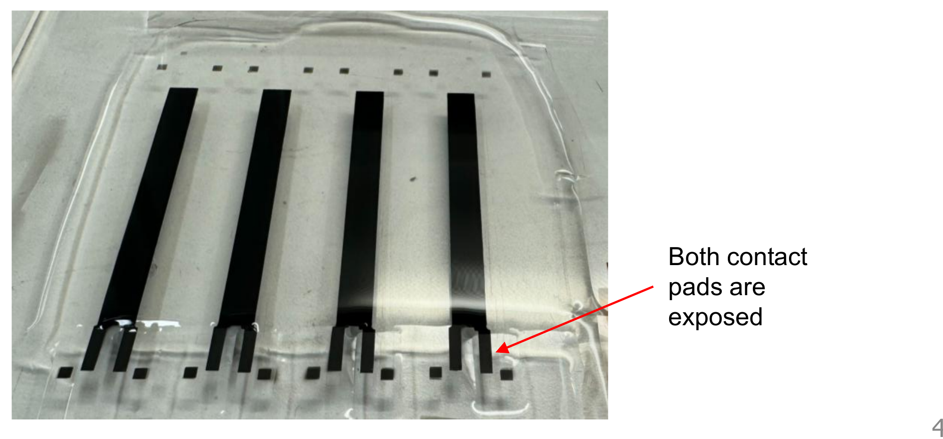 Photo of the finished strips with both contact pads exposed after the top Ecoflex coat