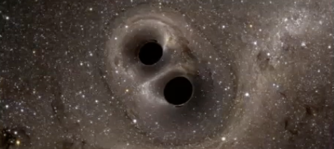 Image of two black holes. Photo credit: Cody Messick’s presentation slides.
