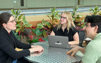 Research Computing Facilitator Christina Koch with a researcher.