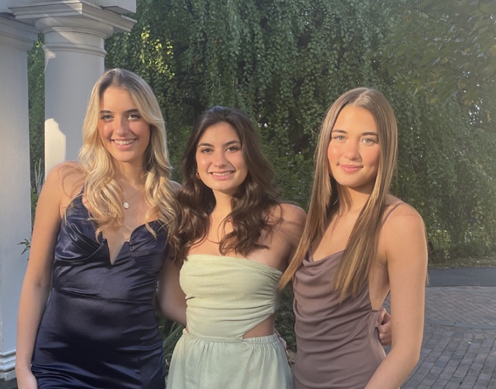 Hannah and her sisters at an event.
