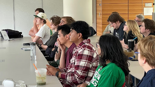 Students at a meeting