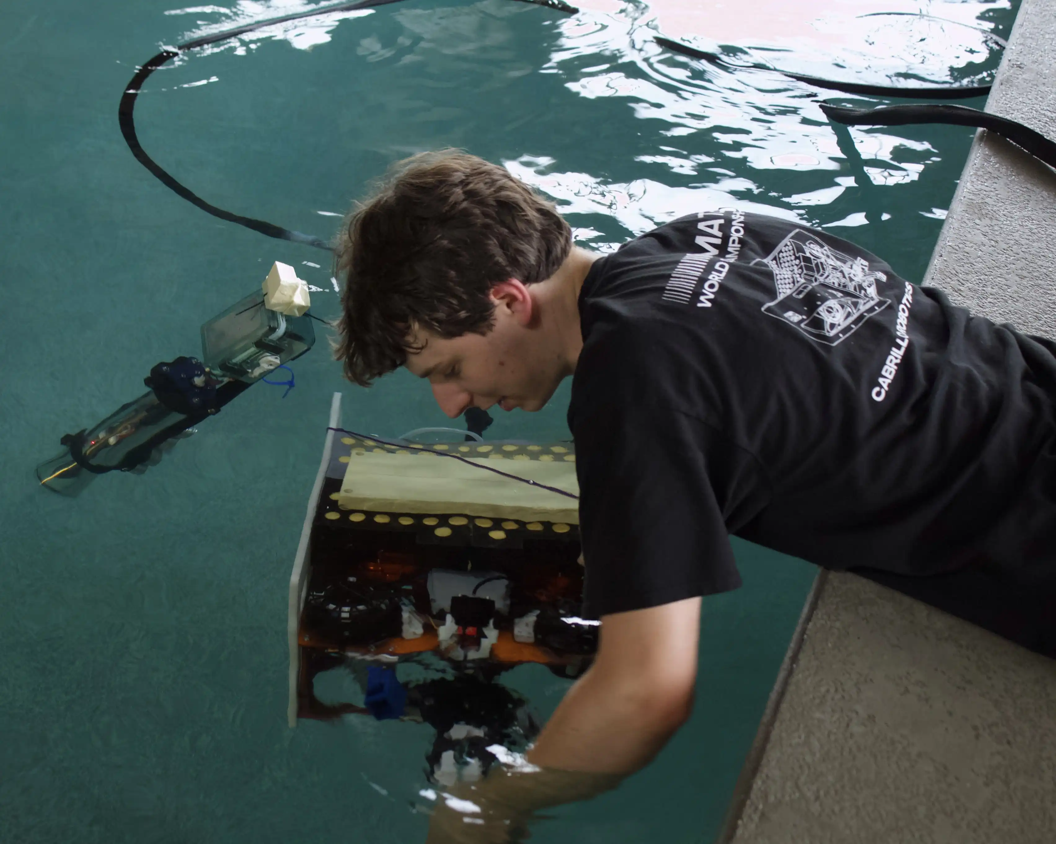 Isaac Wax and the SeaHawk II at a pool test before the product demo