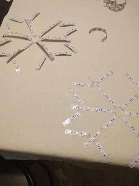 photo of snowflakes made out of LEDs