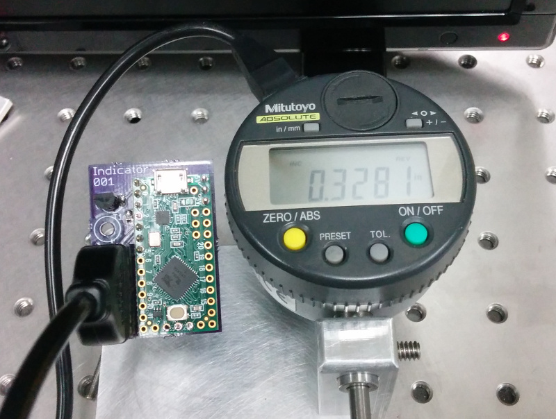 a picture of the mitutoyo indicator and my oshpark board