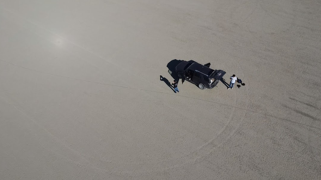 Weather balloon recovery image showing the team flying drones to search for and recover the balloon after the GPS failed.
