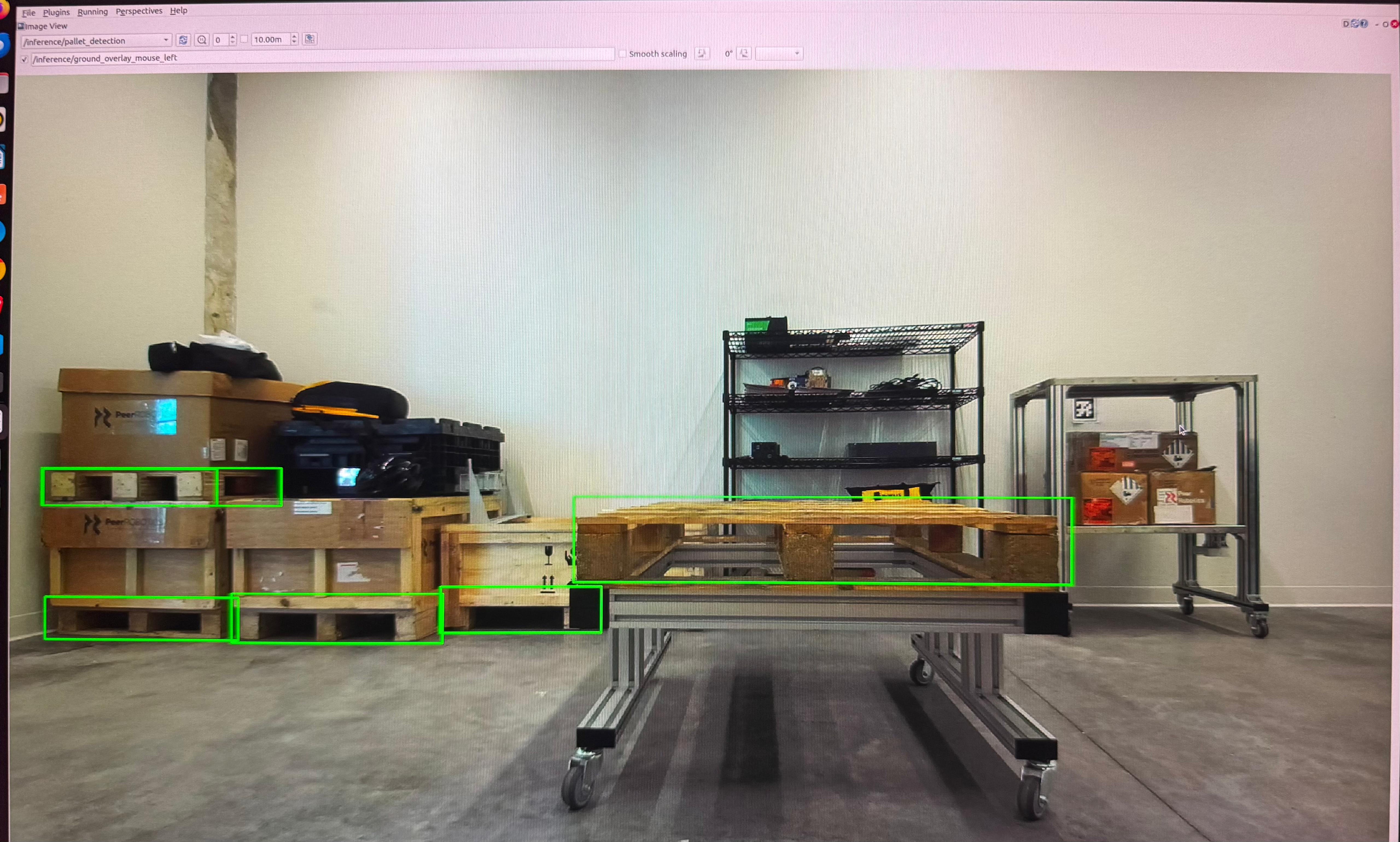 rqt Image View showing green boxes around stacked pallets on the left and a pallet on a cart in the centre of a warehouse
