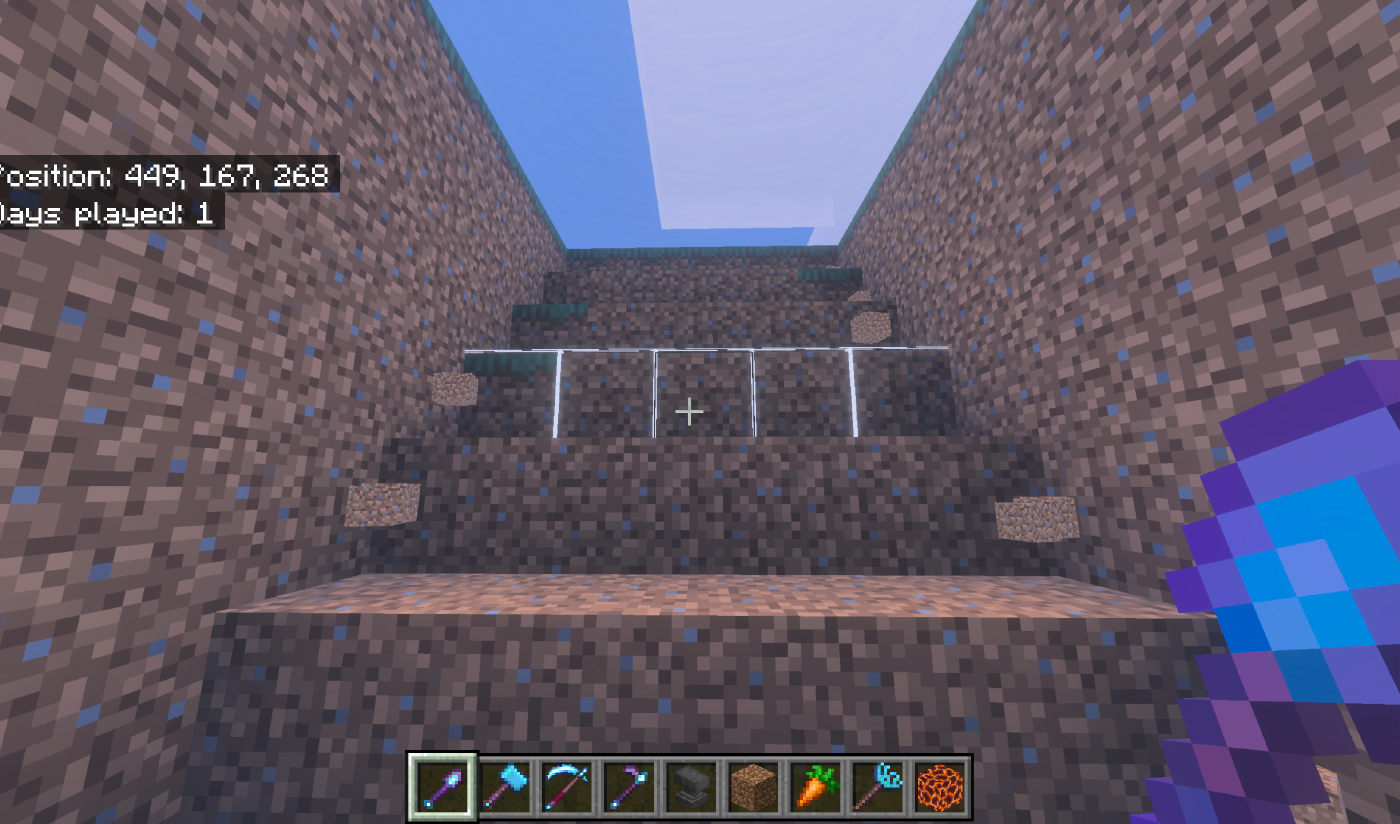 A descending stair-step ramp cut through dirt