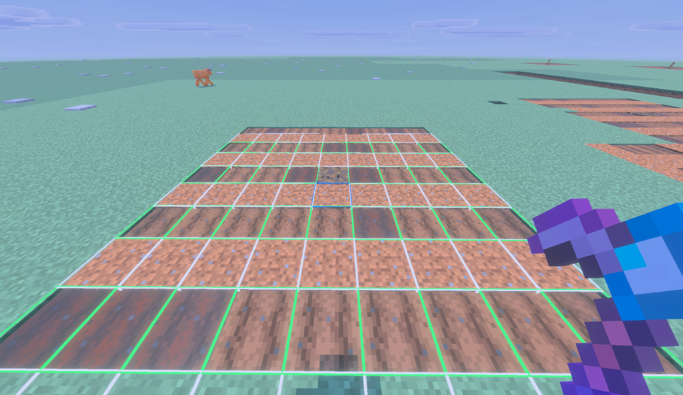 A finished plot of alternating farmland and dirt rows, outlined in white and green