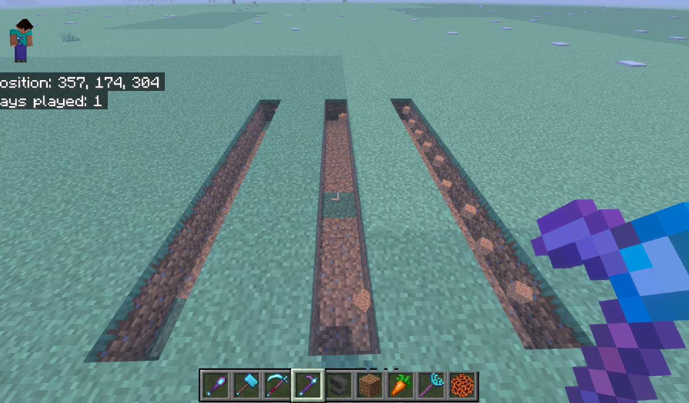Three parallel dug trenches in a grass field
