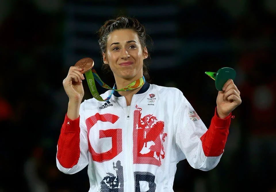 Bianca Cook on the podium at Rio 2016 with her Olympic bronze medal