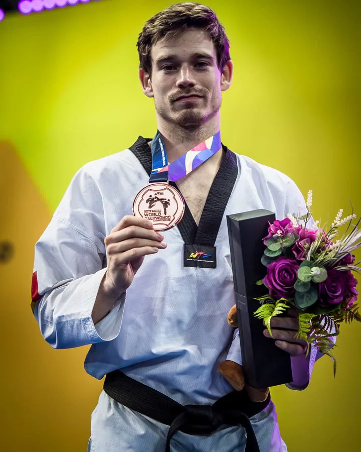 Aaron Cook with his World Championship medal at Muju 2017