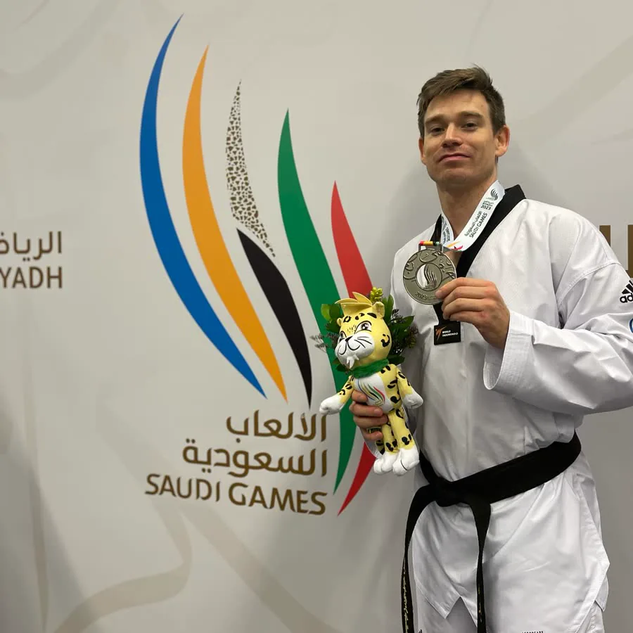 Aaron Cook with his Saudi Games medal in Riyadh, 2023