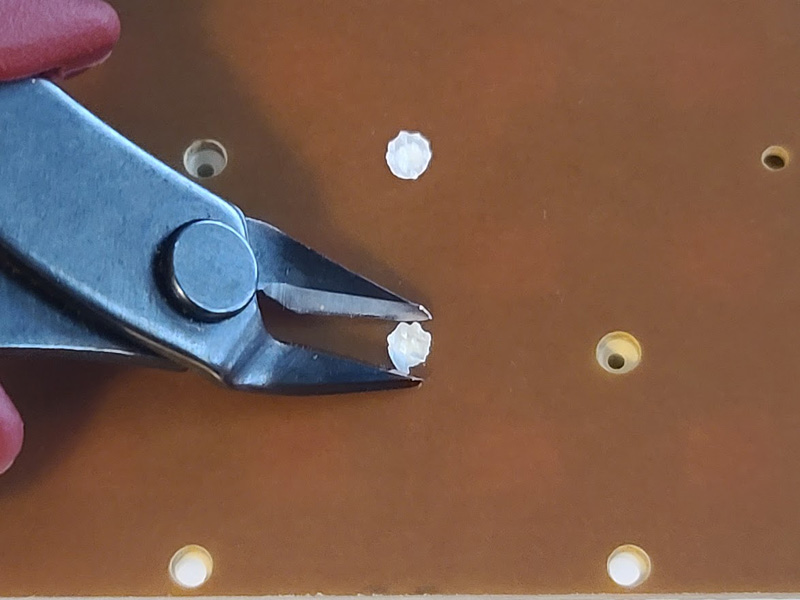 TCD Keypad Cutting Plastic Welds