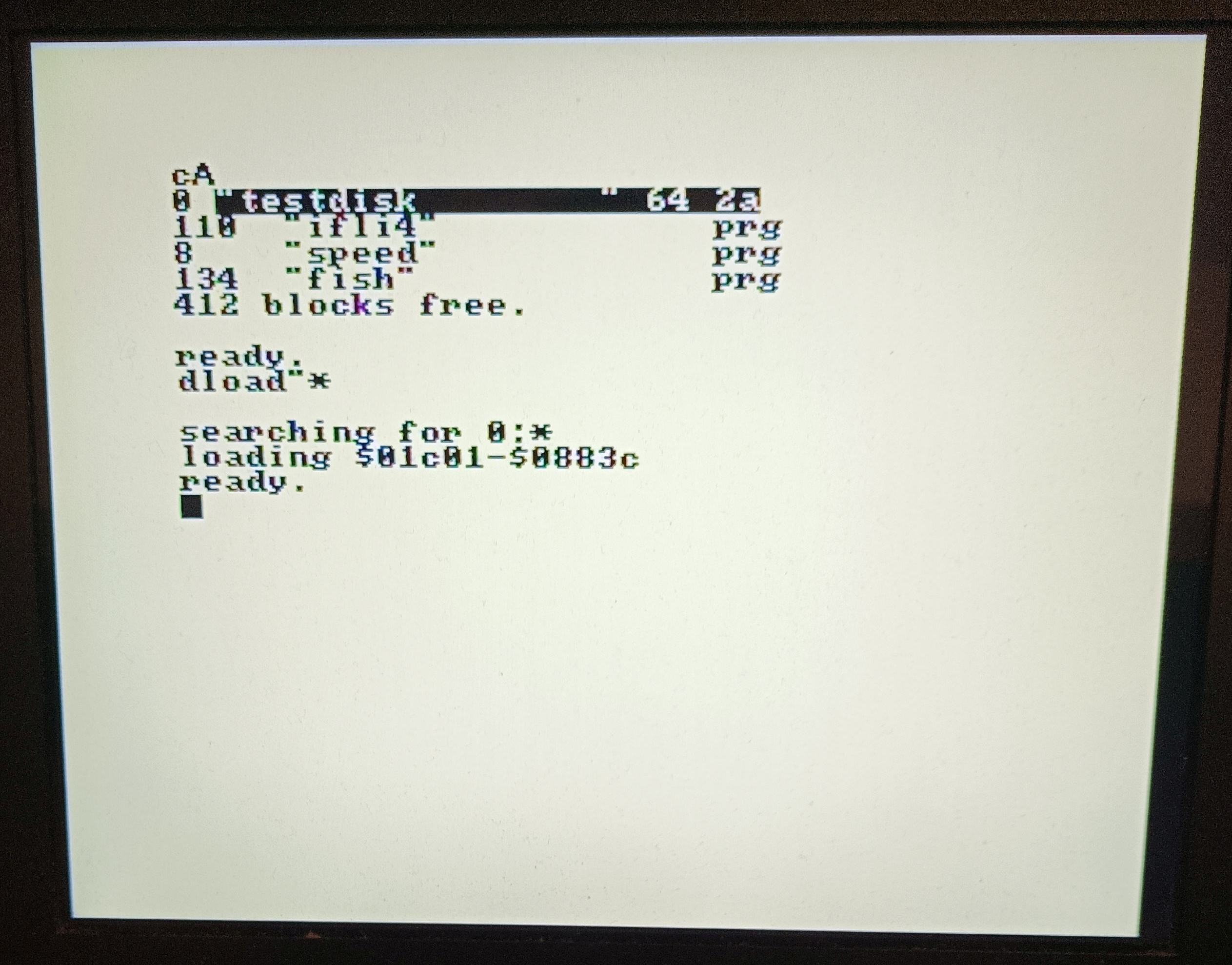 C128 screen with DolphinDOS 3 activity