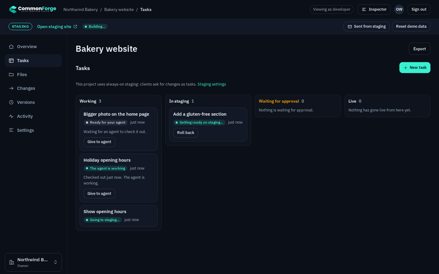 Tasks board with client tasks, one on staging and one an agent is working on