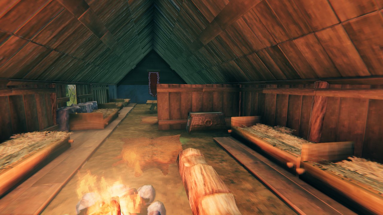 Inside the Longhouse: beds on sleeping platforms round the fire