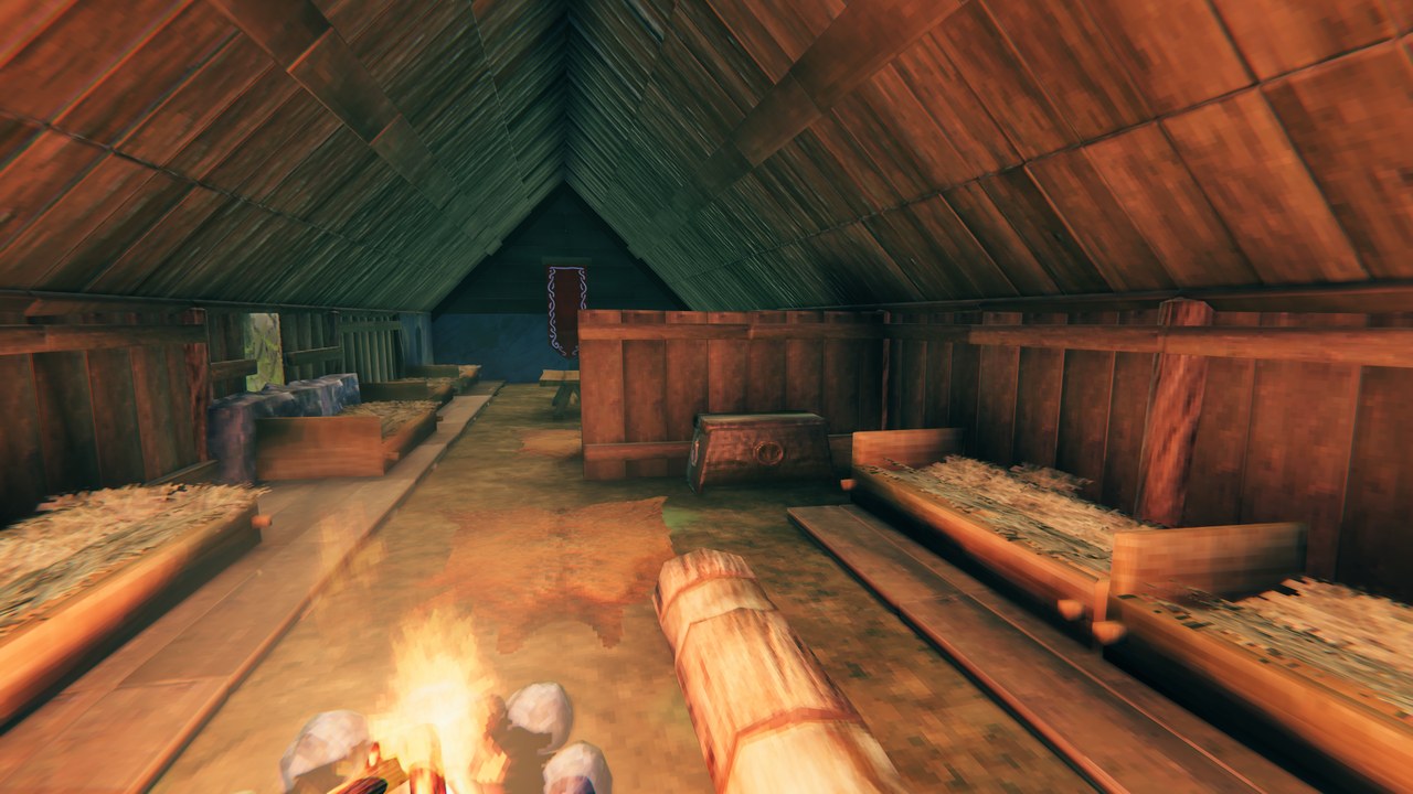 Inside the Longhouse: beds on sleeping platforms round the fire