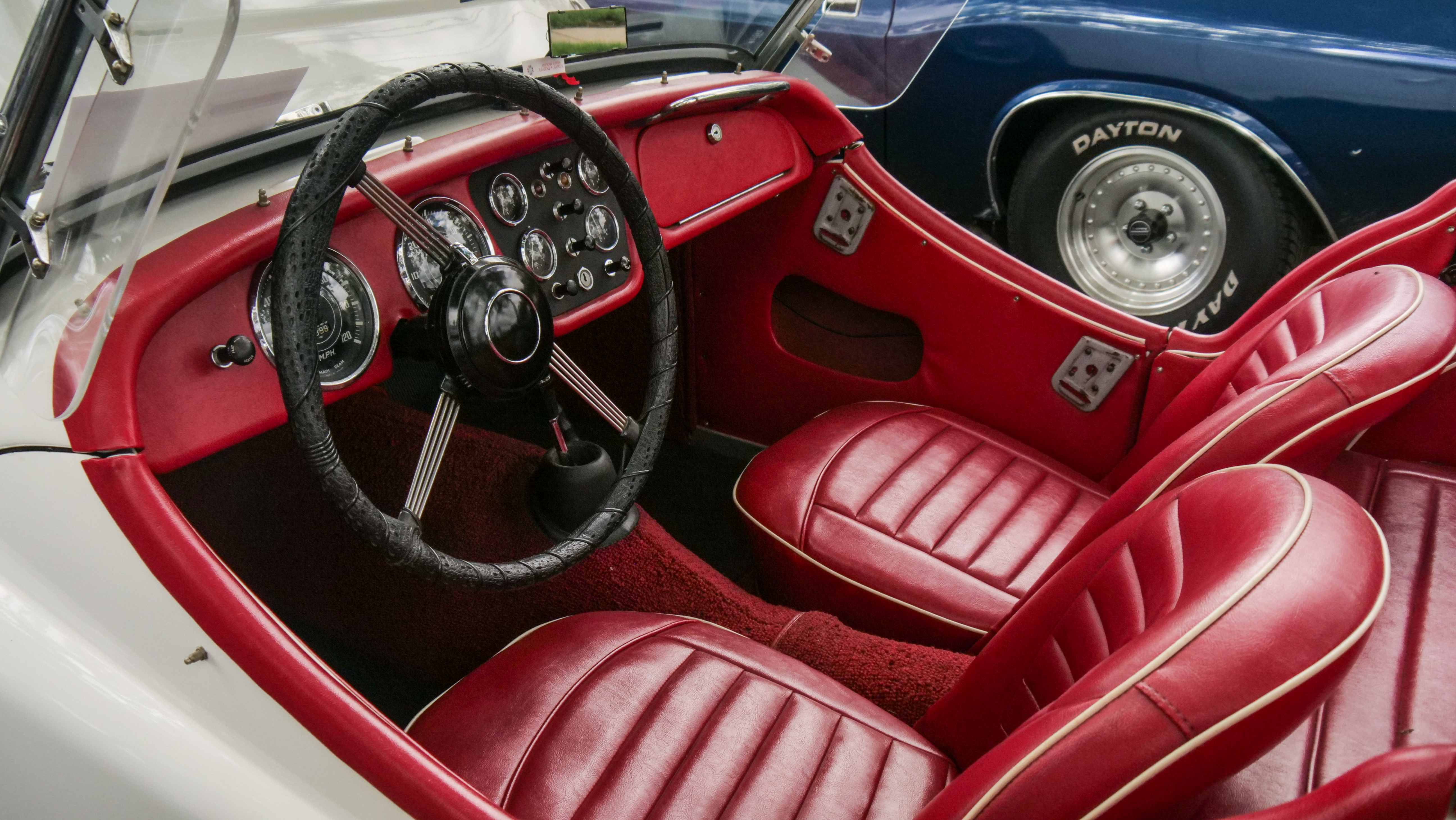 Automotive interior red photography Rule of 3rd Mvmt