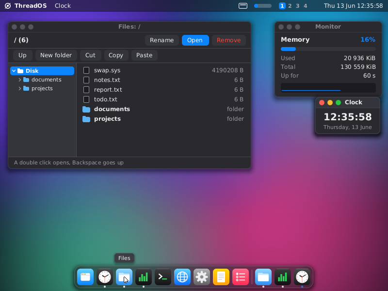 The desktop: a file manager, a clock and a memory monitor