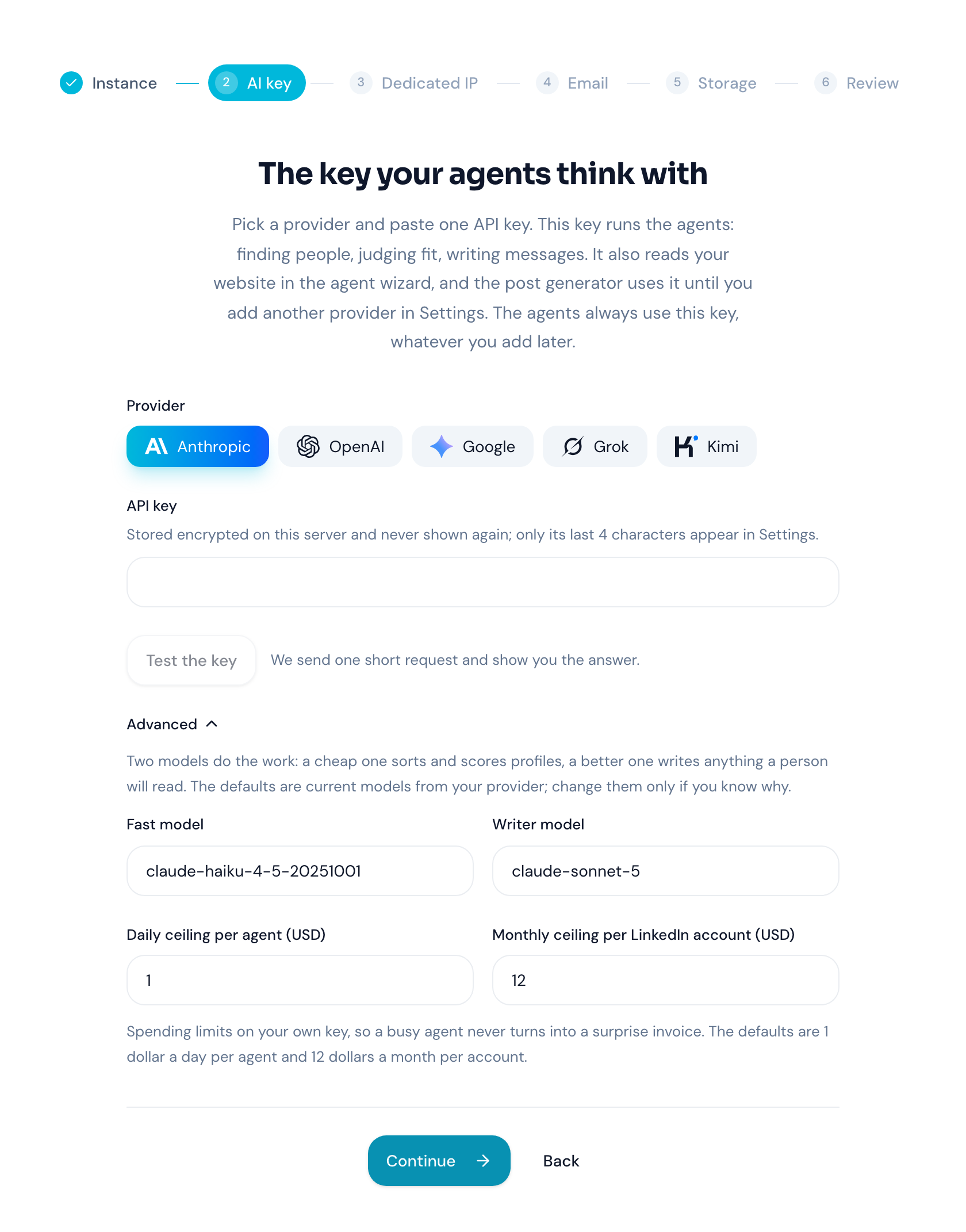The setup wizard asking for the AI key that runs the agents, with the models and the spending ceilings