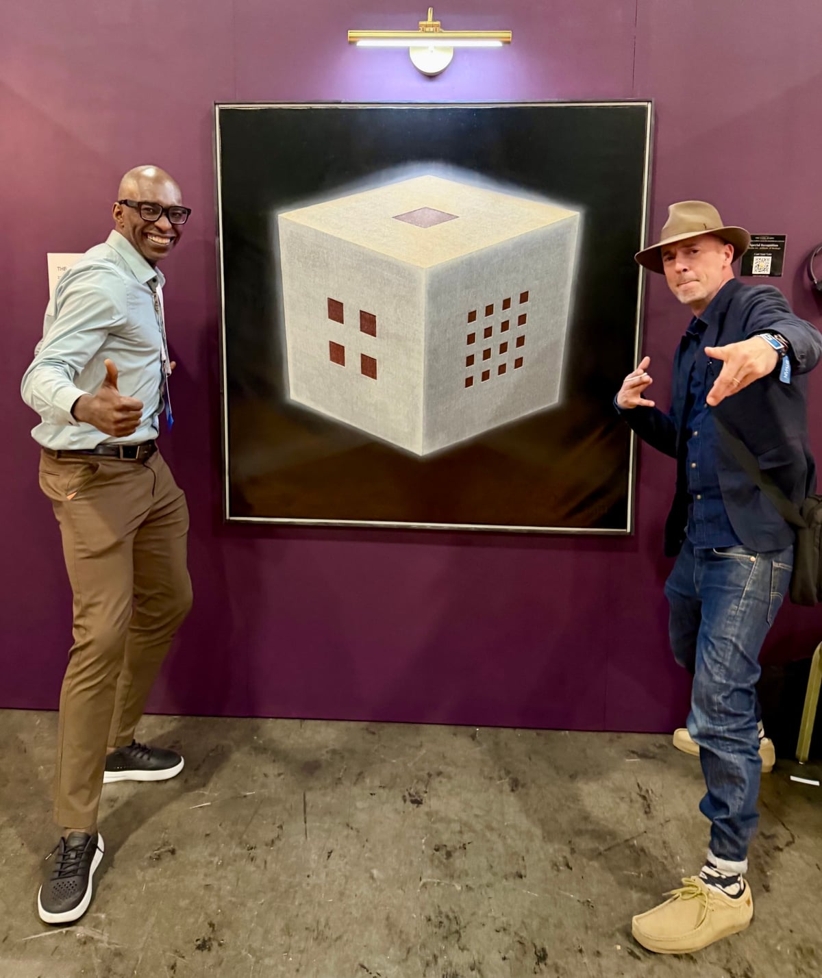 Anik Malcolm with his painting The Whole Entire Universe