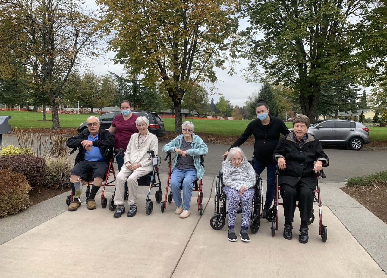 Residents with caregivers on morning walk