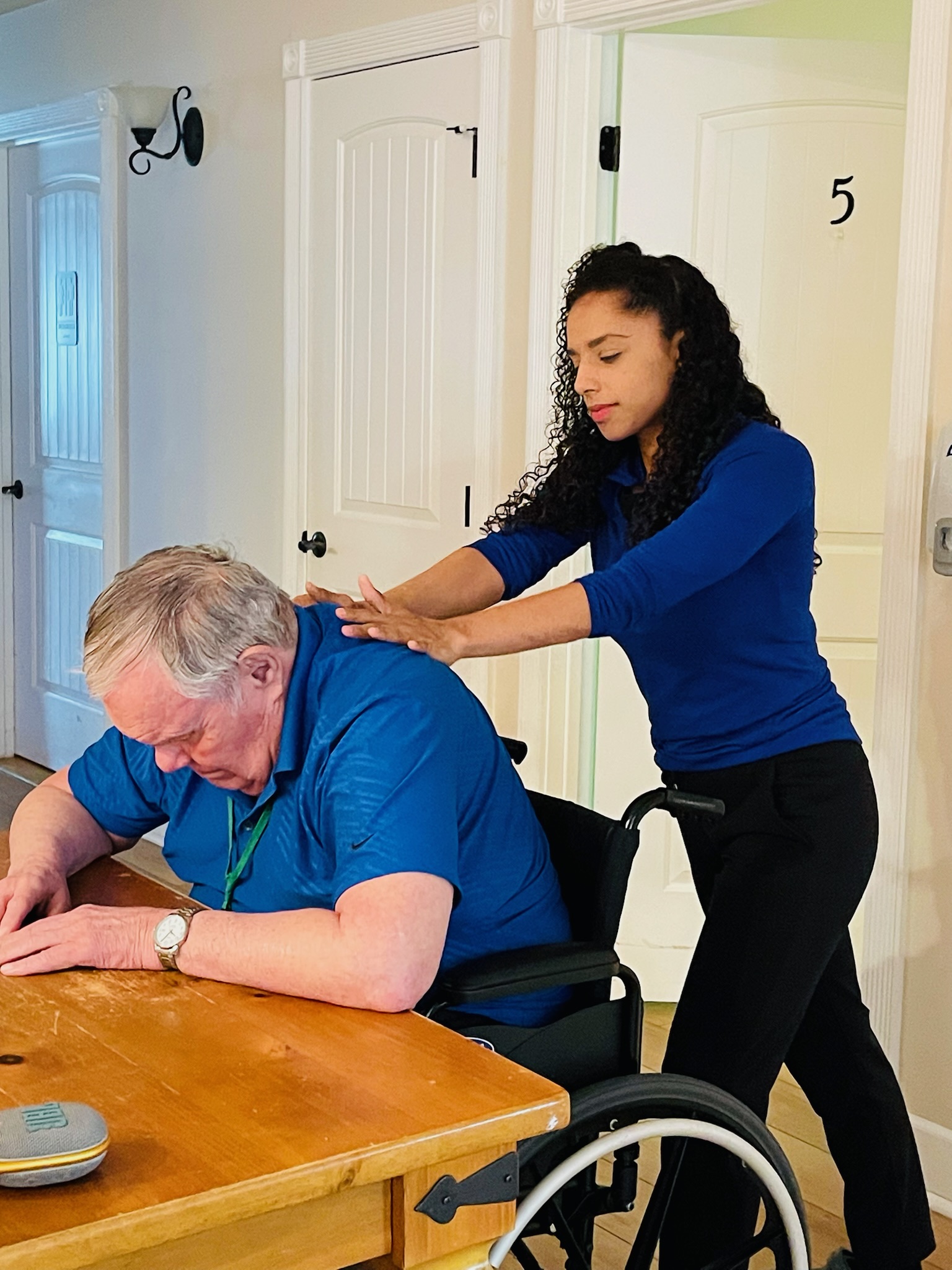 Caregiver with senior resident