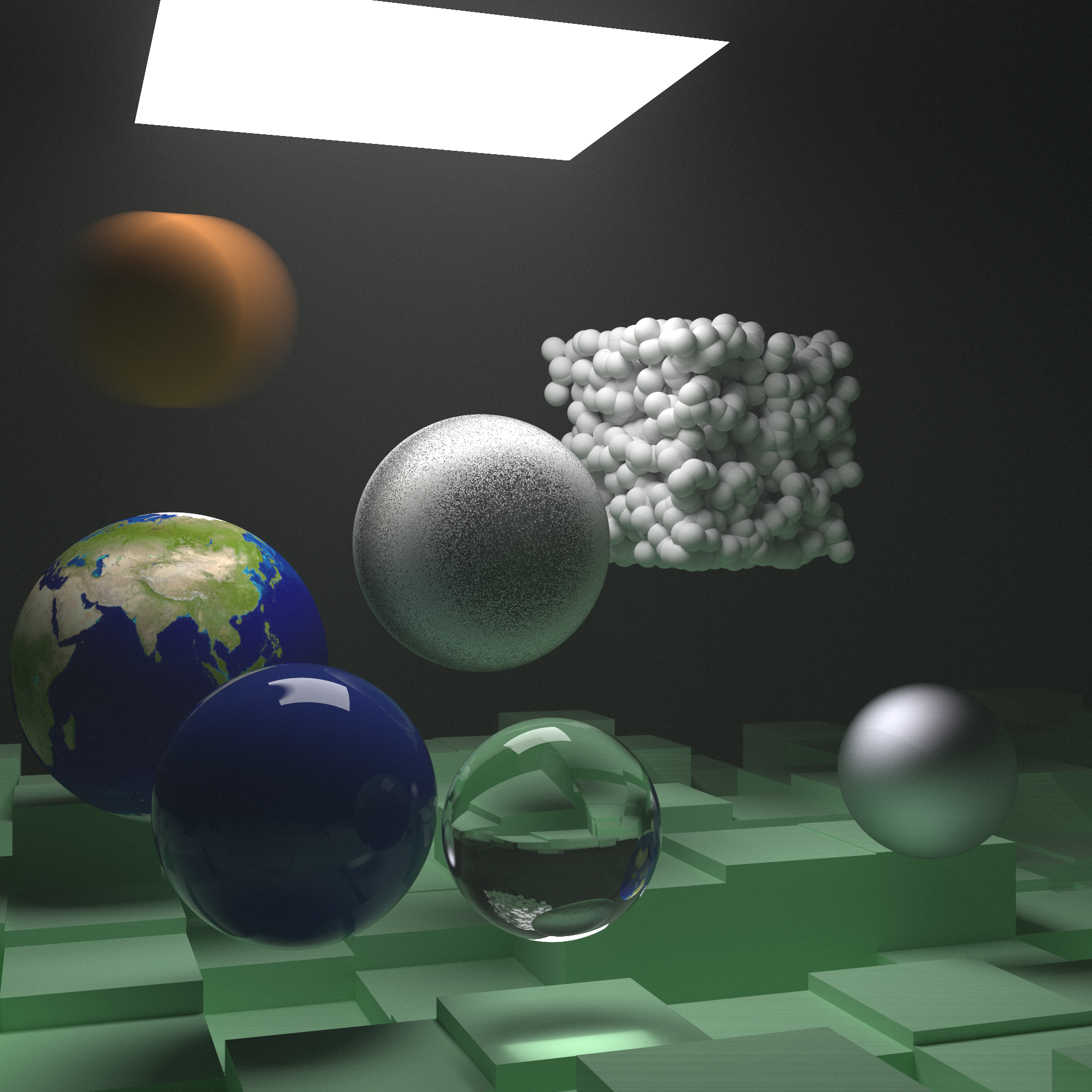 A collection of spheres in an isotropic scattering colume, showcasing the featureset of the renderer